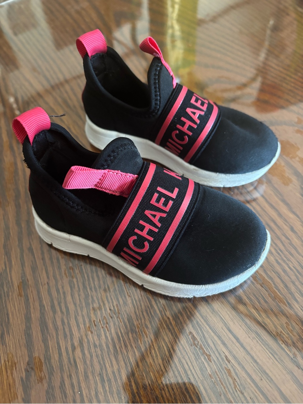 MICHAEL Michael Kors Black Sneakers with Hot Pink Accents